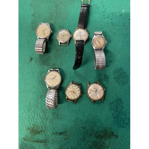 704 - 7 wrist watches