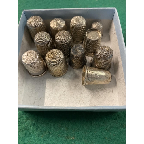 725 - Silver thimbles