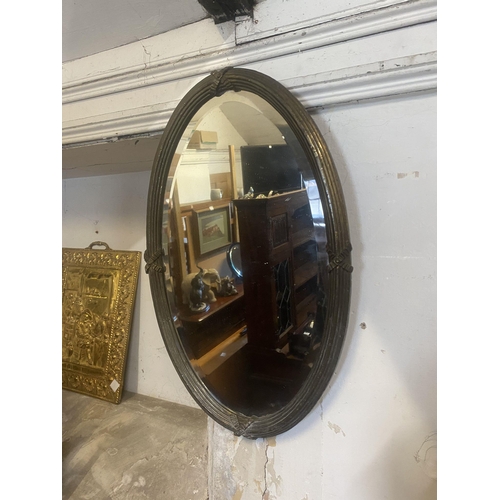 162 - Oval decorative mirror