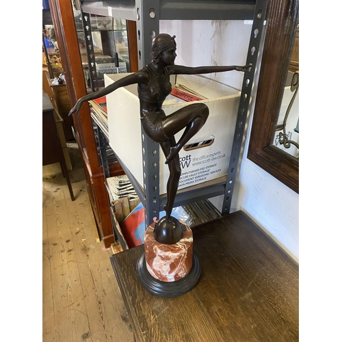 283 - Bronze figure dancing lady on a marble pedestal