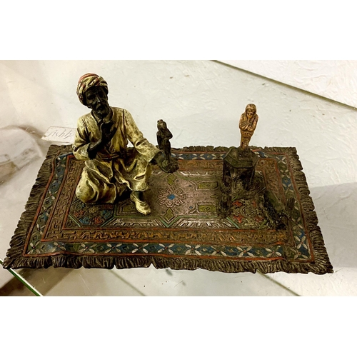 736 - Cold painted Bergman bronze Arab on carpet