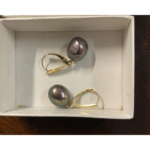 745 - Pair 14 ct gold mounted black pearl earings