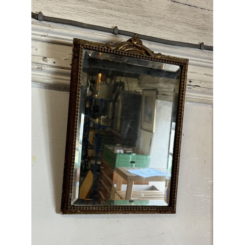 819 - Small gilt wall mirror