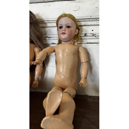 210 - Antique porcealin headed doll