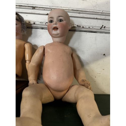 212 - Antique porcealin headed doll