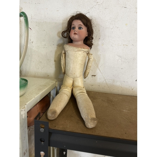 234 - Porcelain headed doll