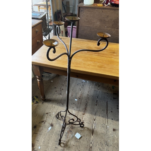 281 - Wrought iron candle stand