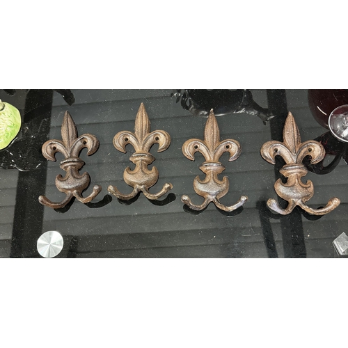 465 - 4 cast iron coat hooks