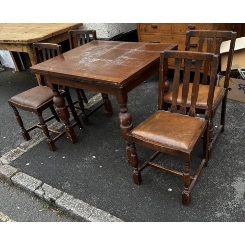 348 - Oak table & 4 chairs