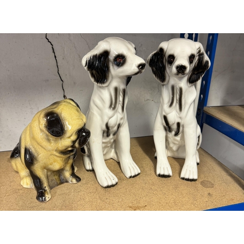 3 - 3 pottery dogs