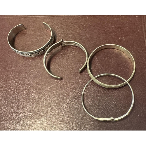 762 - 4 silver bangles