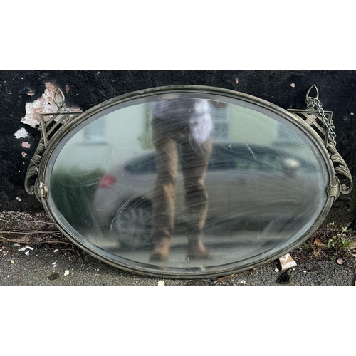 748 - Vintage metal framed oval mirror