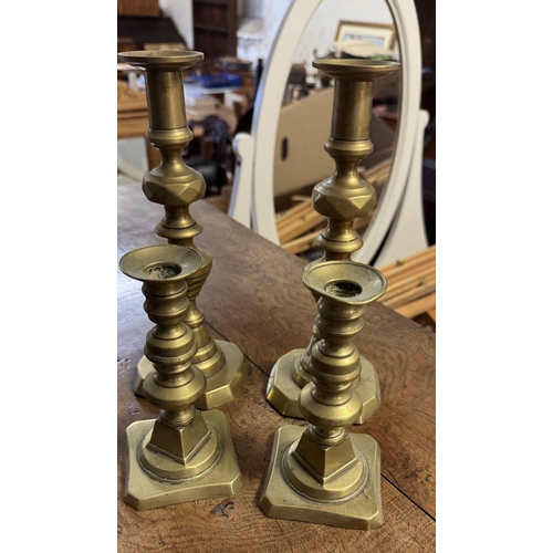 27 - 2 pairs brass candlesticks