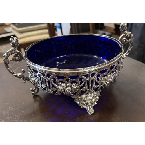 663 - White metal bowl with blue glass liner