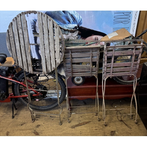 783 - Wrought iron table & 2 chairs-in need of refurbishment