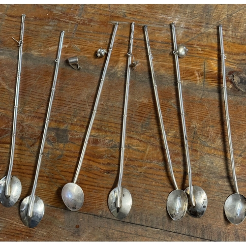 686 - Silver oriental straw spoons