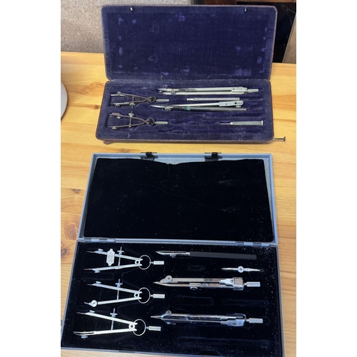 111 - 2 cases draughtmans compasses etc