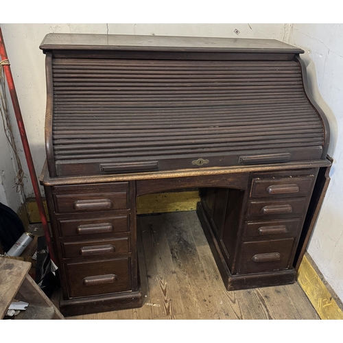 125 - Victorian oak roll top desk