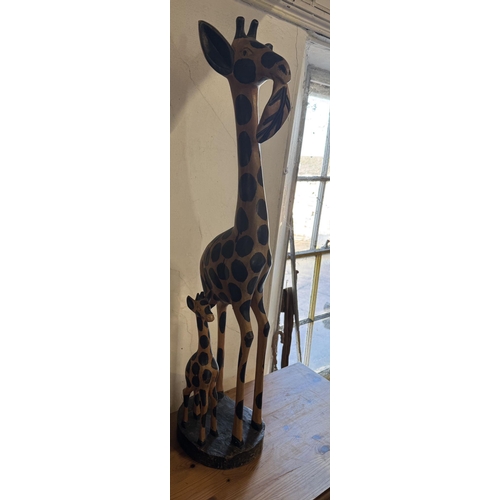 62 - Wooden giraffes