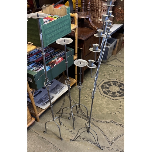 573 - 4 metal candle stands