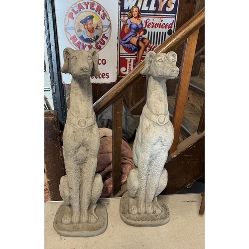 1144 - Pair of seated stoneware French whippets