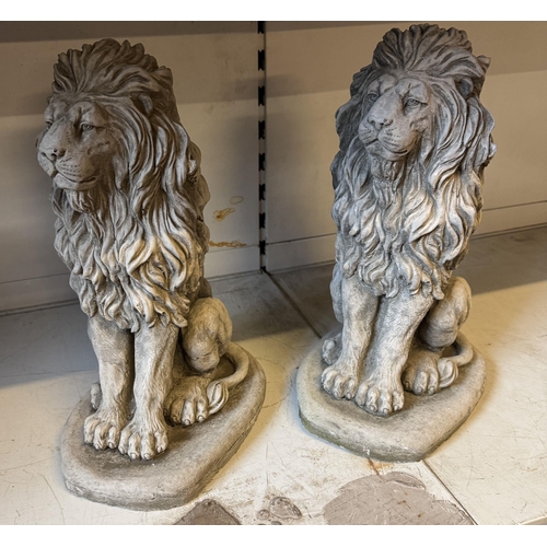 997 - Pair stoneware seated Lions