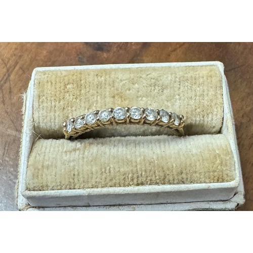 176 - 9ct gold half eternity rin