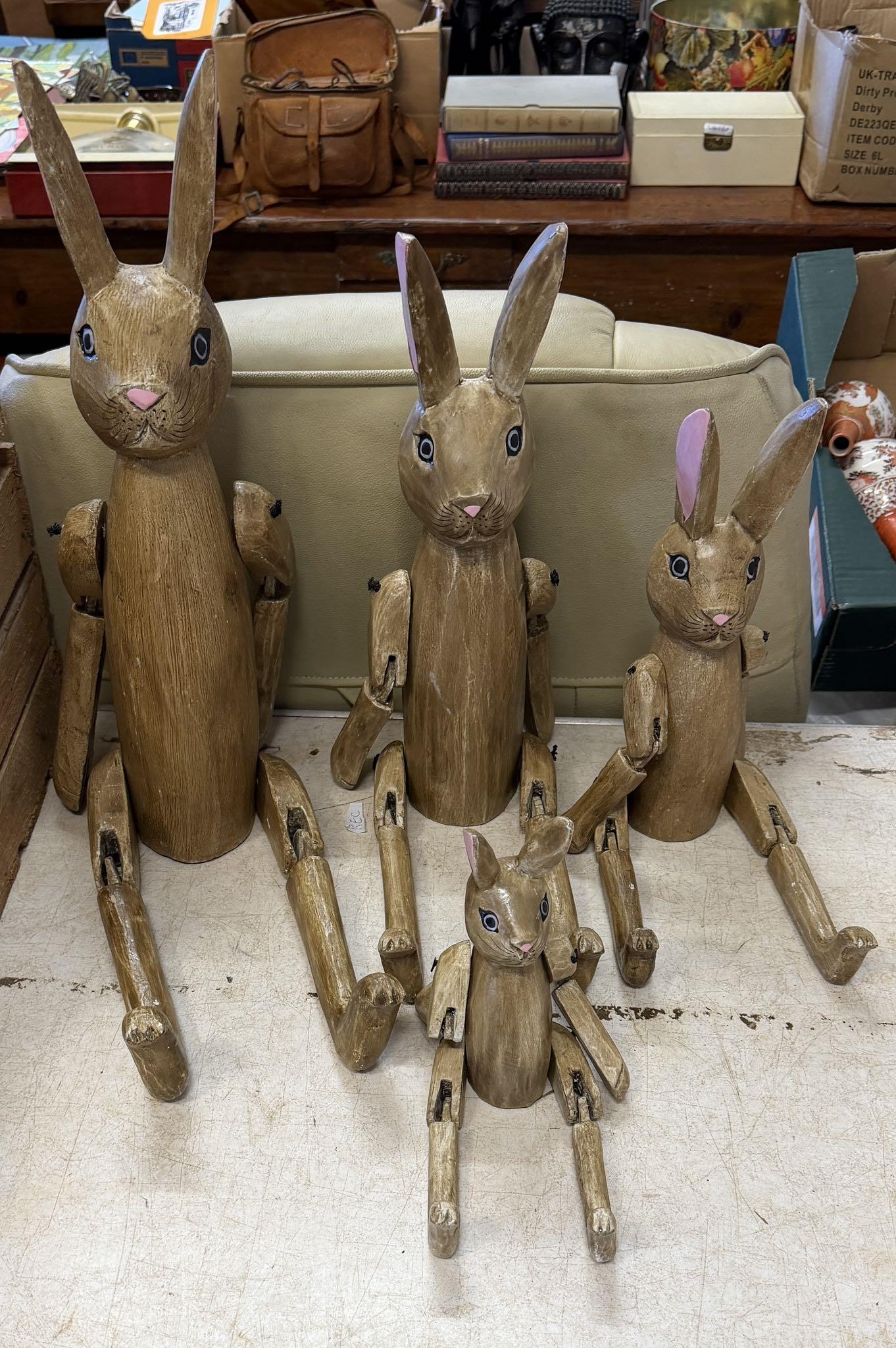 4 wooden jointed rabbits