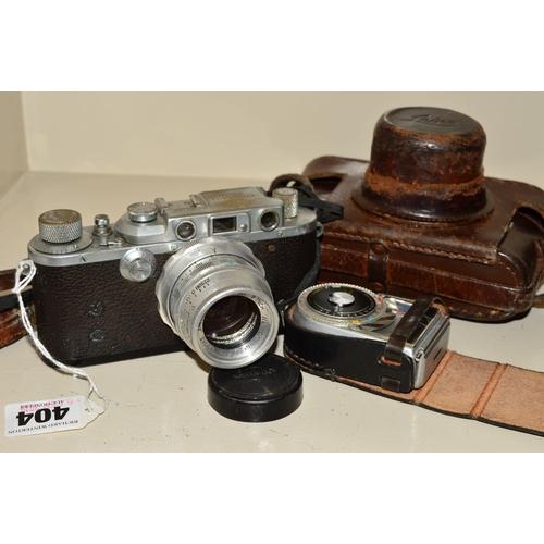 404 - A LEICA IIIA CAMERA IN ORIGINAL LEATHER CASE, fitted with a Cooke Amotal Anastigmat 2'' f2 lens, man... 