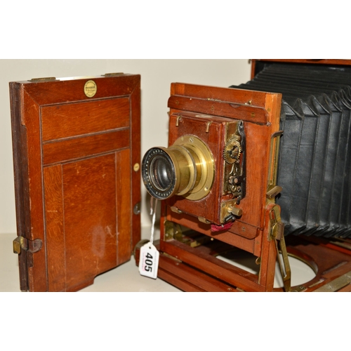 405 - A THORNTON PICKARD PLATE CAMERA, with mahogany case and brass adornments and fitted with a Rectoplan... 