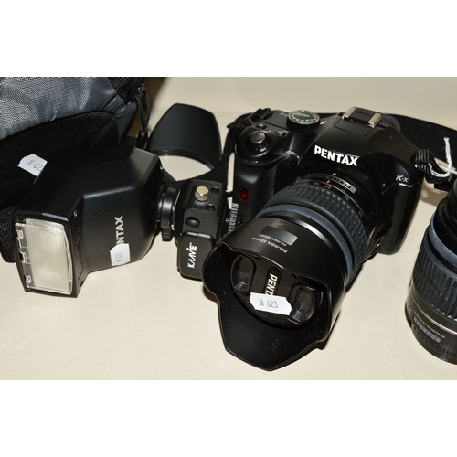 406 - A PENTAX K-X SR DIGITAL SLR CAMERA, fitted with a DA L 18-55mm f3.5 AL lens, a Pentax DA L 50mm-200m... 