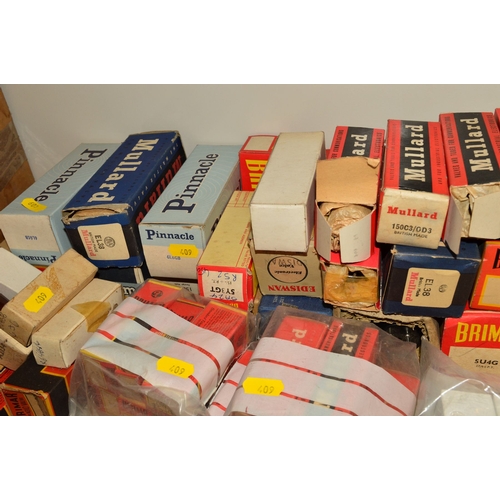 409 - A COLLECTION OF OVER FIFTY VINTAGE VACUUM TUBES (THERMIONIC VALVES), mostly in original boxes from m... 