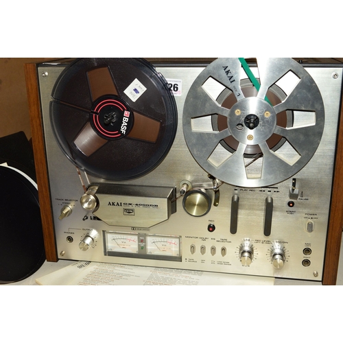 426 - AN AKAI GX4000 DB REEL TO REEL TAPE RECORDER, with a bag of tapes, runs and plays but slow to start ... 