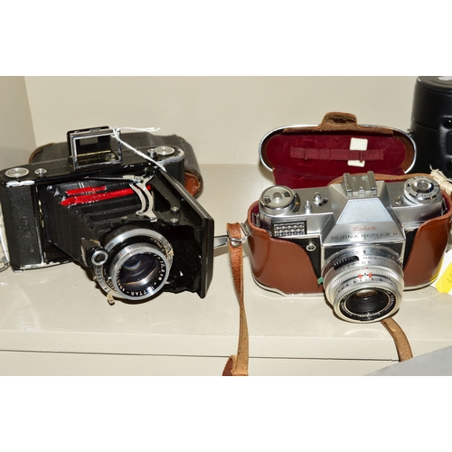 460 - A BOX OF CAMERAS AND OPTICAL EQUIPMENT, including a Zeiss Ikon Nettar 515/2, an Olympus OM10 fitted ... 