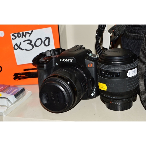 472 - A SONY A300 DIGITAL SLR CAMERA, fitted with a 18-55 f3.5 lens with box and 5-CF cards (no battery or... 