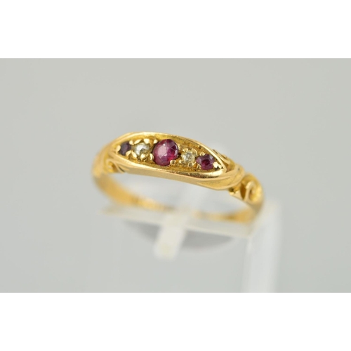 182 - AN 18CT GOLD EDWARDIAN RUBY AND DIAMOND DRESS RING, ring size N, hallmarked 18ct gold, Birmingham 19... 