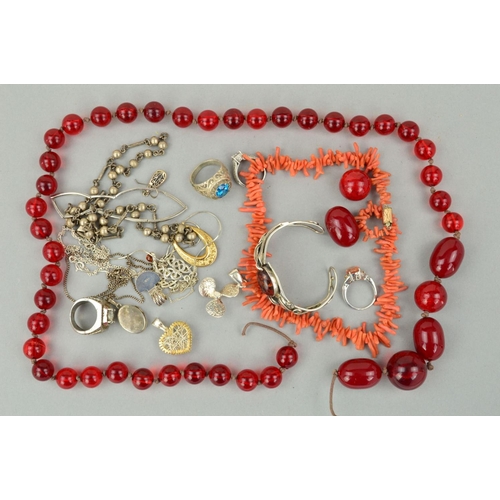 223 - A SELECTION OF JEWELLERY, to include a broken red plastic bead necklace, a branch coral necklace, a ... 