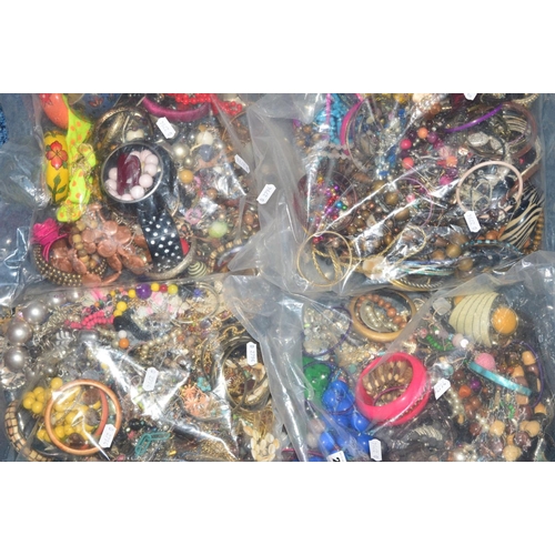 266 - FOUR BAGS OF COSTUME JEWELLERY