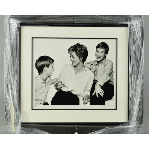 526 - JOHN SWANNELL 'PRINCESS DIANA, PRINCE WILLIAM, PRINCE HARRY 1994', a black and white photographic pr... 