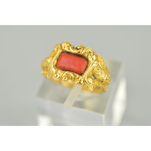 54 - A LATE GEORGIAN GOLD AND CORAL RING, centering on rectangular coral stone (which is a likely later r... 