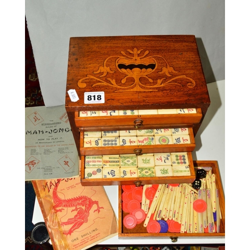 818 - A MAH-JONG SET, bone and bamboo, housed in a table top five drawer cabinet, with two Mah Jong bookle... 