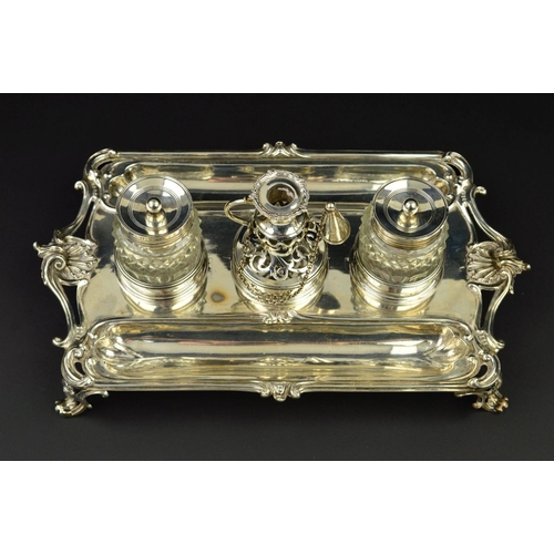 112 - A GEORGE III SILVER SHAPED RECTANGULAR INKSTAND, fitted with a central taperstick with removable sco... 