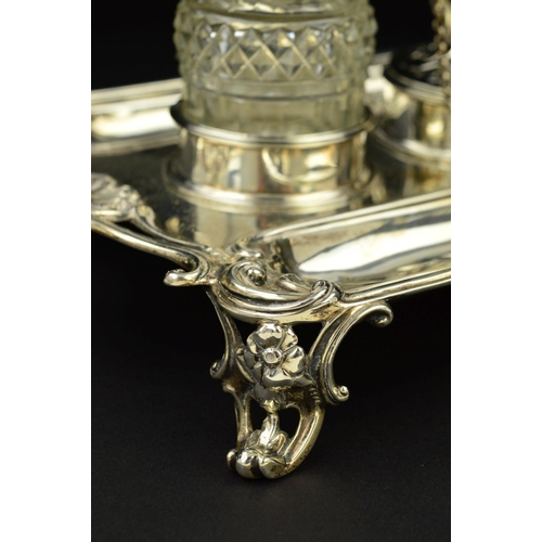 112 - A GEORGE III SILVER SHAPED RECTANGULAR INKSTAND, fitted with a central taperstick with removable sco... 