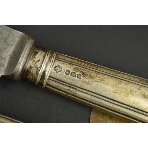 113 - A SET OF GEORGE V SILVER HANDLED MEAT AND GAME CARVERS AND A MATCHING SET OF EIGHT TABLE KNIVES, ste... 