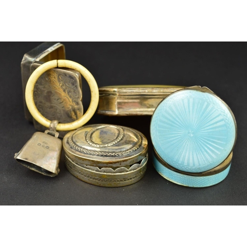 118 - A GEORGE V SILVER AND PALE BLUE ENAMEL POWDER COMPACT, of circular form, engine turned decoration, m... 