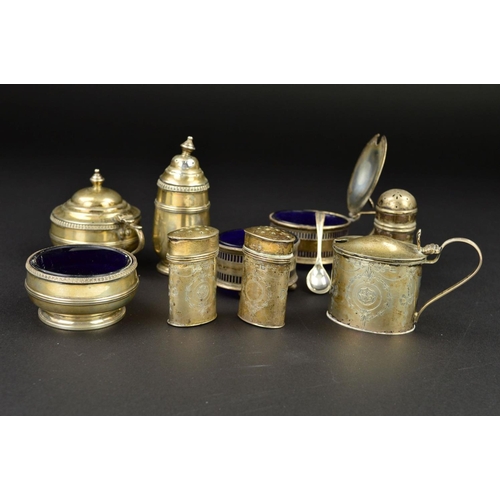 124 - THREE SETS OF SILVER THREE PIECE CRUET SETS, two of oval form and one circular, the circular and pie... 