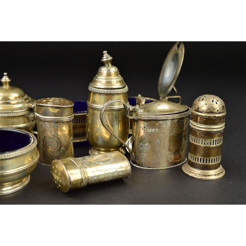 124 - THREE SETS OF SILVER THREE PIECE CRUET SETS, two of oval form and one circular, the circular and pie... 