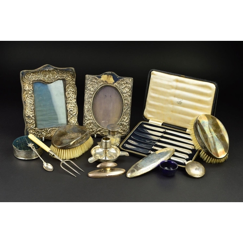 131 - A PARCEL OF SILVER, the majority Edwardian and George V, includes a pair of oval silver backed brush... 