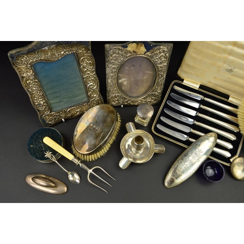 131 - A PARCEL OF SILVER, the majority Edwardian and George V, includes a pair of oval silver backed brush... 