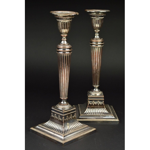 134 - A PAIR OF LATE 19TH CENTURY NEO-CLASSICAL STYLE SHEFFIELD PLATE CANDLESTICKS, detachable sconces, ta... 